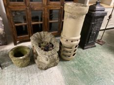 Garden items: stone pots, chimney pot and decorative candle sconce and a cast iron stove