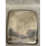Sterling silver hip shaped cigarette case by Sampson Morden & co; An Asprey 8 day movement bedside