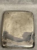 Sterling silver hip shaped cigarette case by Sampson Morden & co; An Asprey 8 day movement bedside