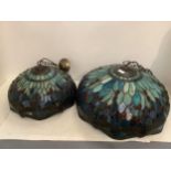 Two decorative Tiffany style lamps, in greens and turquoise colours, the larger, approx 50 cm diam ,