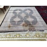 Bokhara Rug, soft pink ground, with 4 central interlocking lozenges, and all over stylized pattern