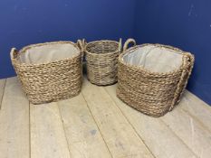 Pair of lined wicker log baskets and wicker basket, in used condition