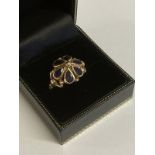 Gold Garnett flower ring