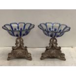 Pair of Russian white metal comports with Russian art glass with blue flash applied later