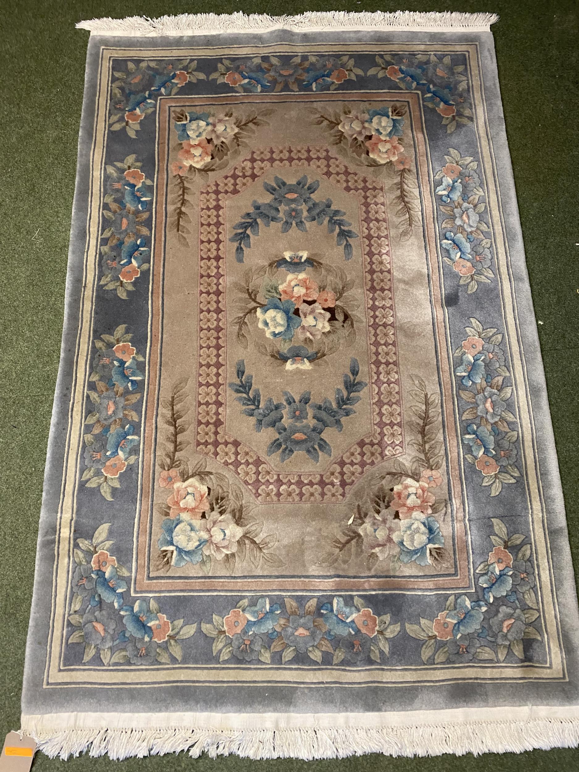 Chinese washed rug, blue and oatmeal ground 190 x 123cm