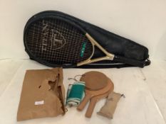Tennis racquet and a vintage table tennis net and bats