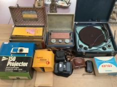 A quantity of vintage camera equipment, cameras, projector, vintage record player/gramophone etc