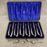 Set of silver handled cutlery with four sterling silver tea spoons