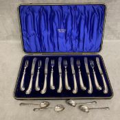 Set of silver handled cutlery with four sterling silver tea spoons