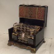 A good quality decorative C19th lacquered, gilded and boulle work, brass inlaid and red stained