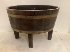 Brass bound and wooden oval raised jardinière plant stand