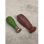 Two seals, one red hardstone and one green (possibly dyed green ivory) & silver mounted example