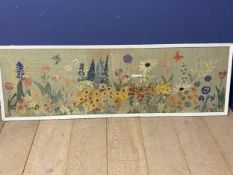 A long oblong crewel work tapestry of flowers and fauna and a cherub, framed and glazed 170 wide