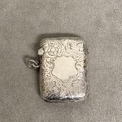 Sterling silver vesta case with chased decoration and vacant cartouche, by John Rose, Birmingham