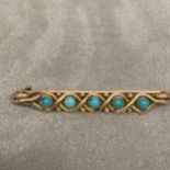 Yellow metal and turquoise bar brooch