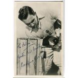 Godfrey Evans. 'Brylcreem'. Mono real photograph postcard of Evans in wicket keeping pose, wearing