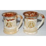 Hambledon C.C. cricket tankards. Pair of earthernware cricket tankards with handles, glazed to front