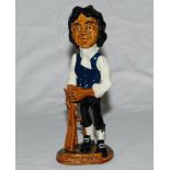 John Nyren- Cricketer Tutor. Ceramic caricature figure of Nyren in cricket attire holding bat with