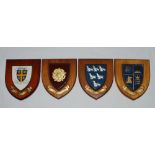 County and club shields. Four wooden shields each with hand painted colour emblem of the county or