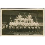 Tottenham Hotspur 1919/20. Mono real photograph postcard of the team and two officials, standing and