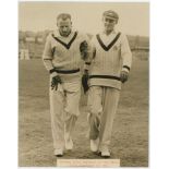 Don Bradman 1934. Original mono press photograph of Bradman being helped off the field by Stan