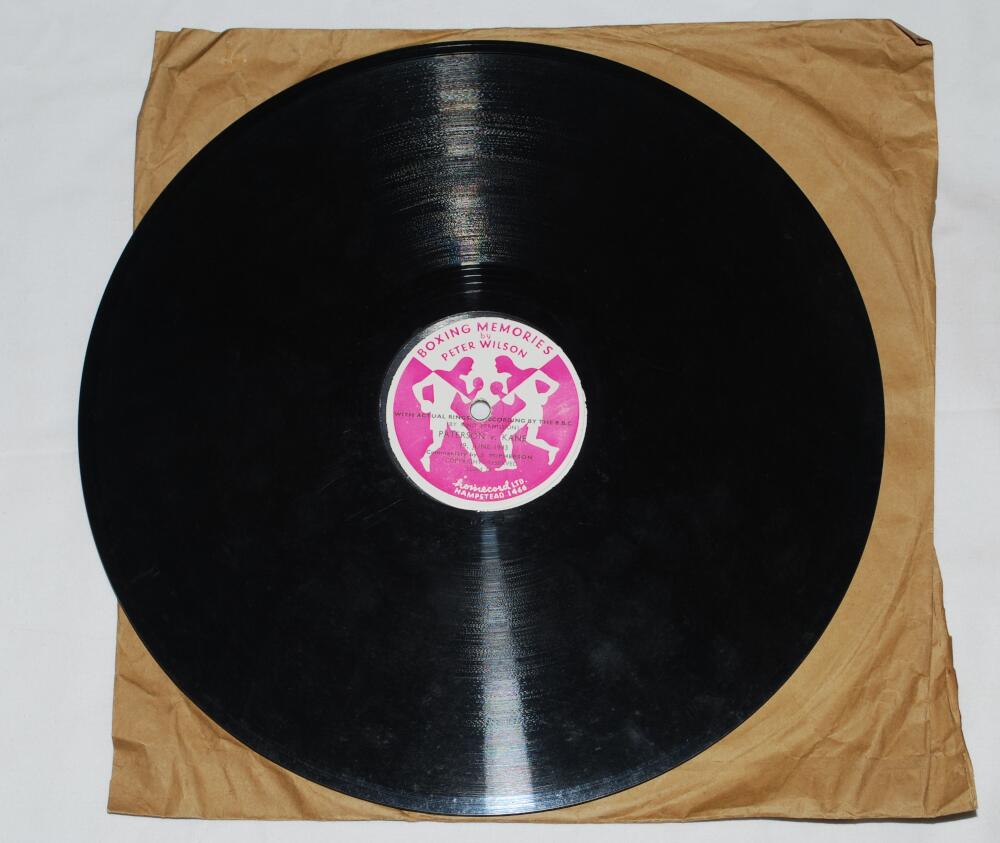 'Boxing Memories' by Peter Wilson. 78rpm record. To one side is the commentary by S. McPherson of