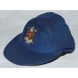Nottinghamshire mid blue county 1st XI cricket cap with county emblem embroidered to front. Player