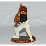 'William Gilbert Grace'. Ceramic caricature figure of Grace in cricket attire holding bat in batting