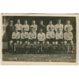 Tottenham Hotspur 1924/25. Mono real photograph postcard of the team and trainer, standing and