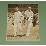 M.C.C. tour to Australia 1928/29. Original mono photograph of Hobbs and Jardine walking out to bat