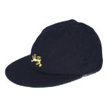 Bruce French. Nottinghamshire & England. Navy blue cloth cap with England lion emblem embroidered to
