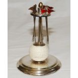 Golf. Silver metal EPNS cocktail stick holder comprising six pronged golf flags with red enamel