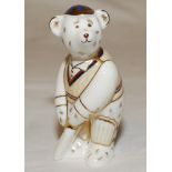 'Cricketer' bear. Royal Crown Derby ceramic figure of a teddy bear in batting pose. 2004. 3.5" tall.