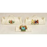 Crested cricket bags. Two large and one small crested china cricket bags with colour emblems for '