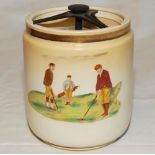Golf tobacco jar. Carlton Ware jar with removable cover c.1910s/1920s. To one side a colour transfer