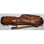 Leather golf bag c.1915 with carrying strap and handle, hood and side pocket. Owner's initials 'J.