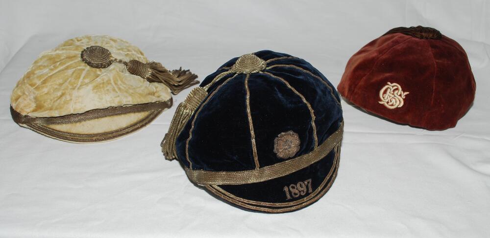 Early silk ceremonial/ honours caps. Three original silk caps, one in navy blue with silver metal