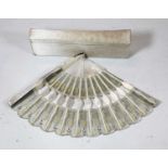 A French fan, having mother of pearl sticks, in original box by J Duvelleroy 'by appointment London,