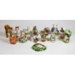 A collection of twelve Beswick Beatrix Potter figures, to include Poorly Peter Rabbit, Hunca Munca