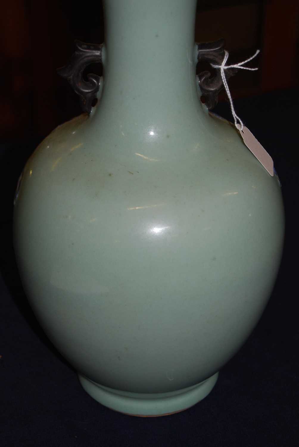 A Chinese export celadon ground baluster vase, having raised blue and white figure and cloud - Image 13 of 14