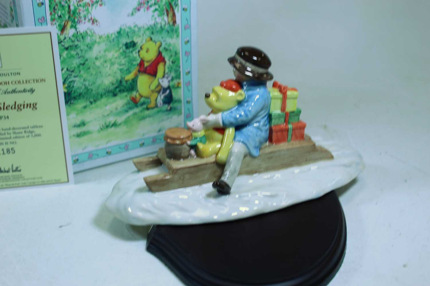 A Royal Doulton Winnie the Pooh collection figure group Going Sledging, No.1185, w.22cm, boxed - Image 3 of 4