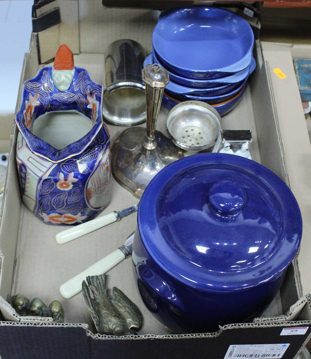 A box containing a collection of ceramics and metalware, to include an ironstone water jug, brass