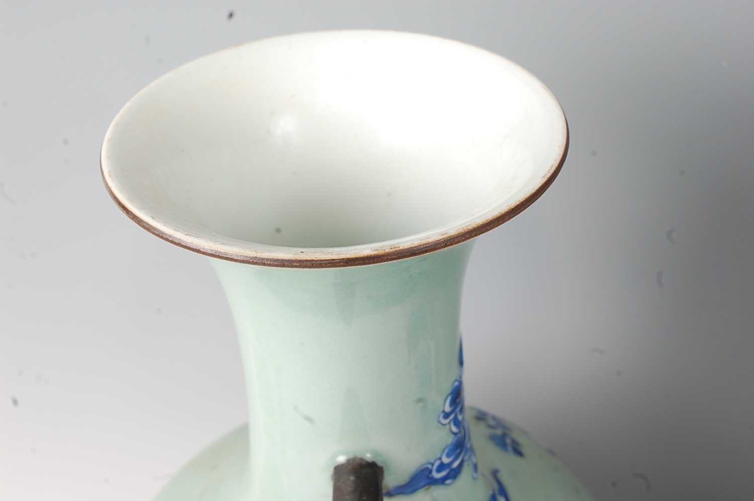 A Chinese export celadon ground baluster vase, having raised blue and white figure and cloud - Image 5 of 14