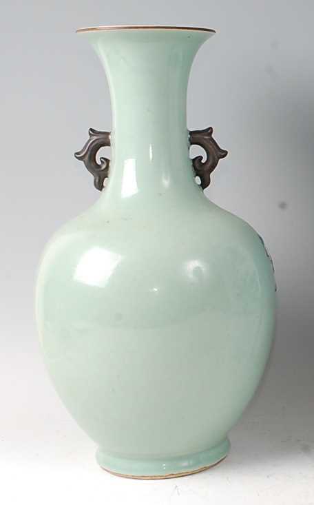 A Chinese export celadon ground baluster vase, having raised blue and white figure and cloud - Image 3 of 14