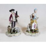 A pair of early 20th century Continental porcelain figures, he in standing pose with bagpipes