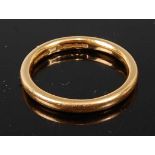 A 22ct 2.7mm court shaped wedding band, size P½, gross weight 5g, hallmarked 22ct, Birmingham