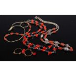 Three various coral set necklaces; together with a pair of coral mounted hoop earrings (4)