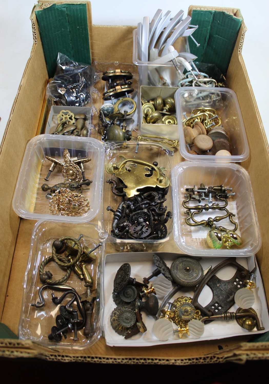 A collection of assorted brass and wooden door furniture etc