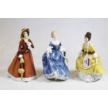 Three Royal Doulton figurines, comprising Hilary HN2335, Julia HN2705, and Coralie HN2307 (3)