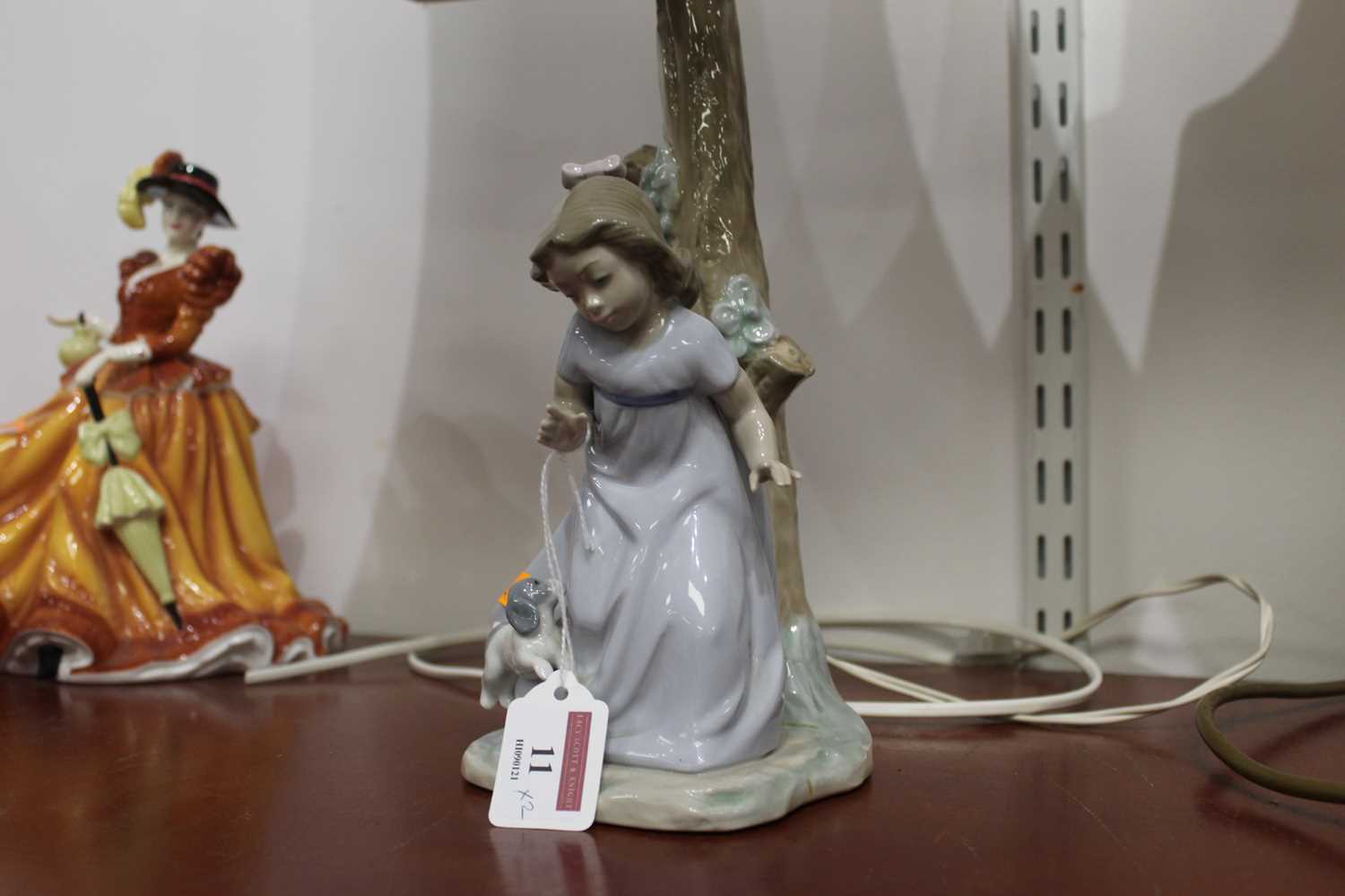 A Nao Spanish porcelain lamp base in the form of a girl against a tree with a puppy at her feet, - Image 2 of 7